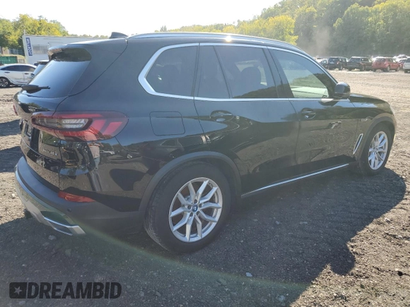 2022 BMW X5 xDrive45e with VIN 5UXTA6C01N9H53033, listed as a Copart auction lot 71154564 with 23,269 mi miles and Salvage Title. Bid and sale history available at carsss.com. Image 3.