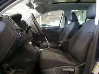 2013 Volkswagen Tiguan SE with VIN WVGBV7AX4DW518545, listed as a Copart auction lot 64585175 with 104,030 mi miles and Salvage title. Bid and sale history available at DreamBid. Image 7.
