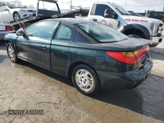 2001 Saturn SC with VIN 1G8ZR12721Z295252, listed as a Copart auction lot 82608074 with 137,076 mi miles and Salvage Title. Bid and sale history available at carsss.com. Image 2.
