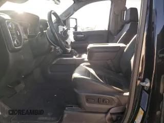 2021 GMC Sierra 3500HD Denali z VIN 1GT49WEY3MF296109, wystawiony jako Copart lot #67886764 z przebiegiem Nie podano mil oraz Szkody całkowita. Historia ofert i sprzedaży dostępna na DreamBid. Obrazek 7.