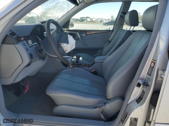 2000 Mercedes-Benz E-Class with VIN WDBJH65J9YB130259, listed as a Copart auction lot 87720045 with 108,479 mi miles and Salvage Title. Bid and sale history available at carsss.com. Image 7.
