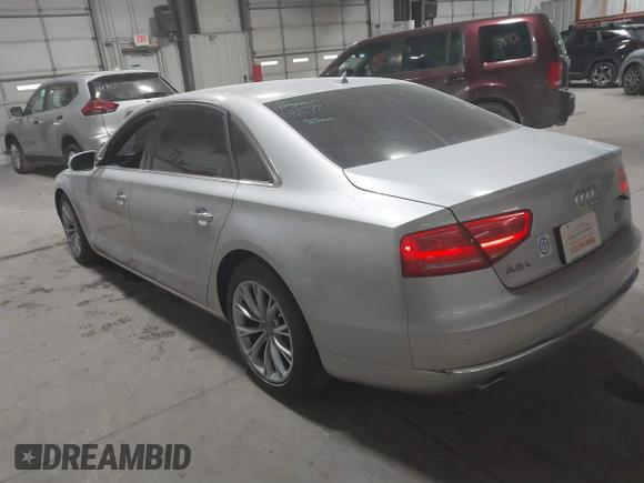 2011 Audi A8 with VIN WAURVAFD5BN014214, listed as a IAAI auction lot 41396044 with 131,764 mi miles and . Bid and sale history available at DreamBid. Image 3.