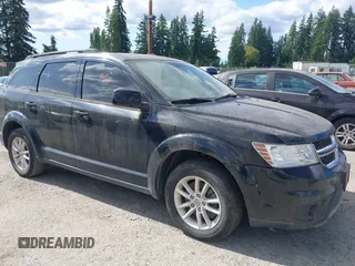 2015 Dodge Journey SXT z VIN 3C4PDCBG5FT742257, wystawiony jako IAAI lot #42577447 z przebiegiem 128 816 mil mil oraz . Historia ofert i sprzedaży dostępna na DreamBid. Obrazek 6.