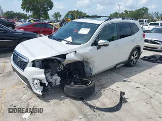 2021 Subaru Forester Touring with VIN JF2SKAXC8MH574427, listed as a IAAI auction lot 42529701 with 11,409 mi miles and . Bid and sale history available at DreamBid. Image 18.