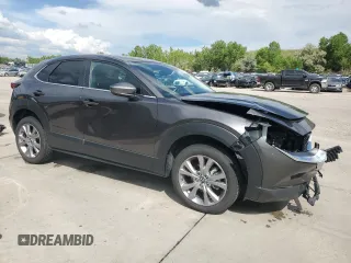 2021 Mazda CX-30 Preferred with VIN 3MVDMBCL4MM302139, listed as a Copart auction lot 59631415 with 47,457 mi miles and Salvage title. Bid and sale history available at DreamBid. Image 4.