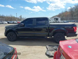 2015 Ford F-150 XLT with VIN 1FTEW1E8XFFB58716, listed as a IAAI auction lot 41854120 with 181,529 mi miles and . Bid and sale history available at DreamBid. Image 14.