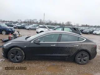 2018 Tesla Model 3 Long Range Battery with VIN 5YJ3E1EB1JF127289, listed as a IAAI auction lot 41484253 with 60,577 mi miles and . Bid and sale history available at DreamBid. Image 14.