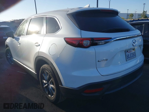 2018 Mazda CX-9 Sport with VIN JM3TCABY8J0204499, listed as a IAAI auction lot 42374933 with 114,408 mi miles and . Bid and sale history available at DreamBid. Image 3.
