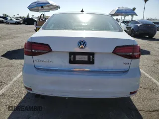 2017 Volkswagen Jetta SEL with VIN 3VWL17AJ3HM297202, listed as a Copart auction lot 57959785 with 113,408 mi miles and Salvage title. Bid and sale history available at DreamBid. Image 6.