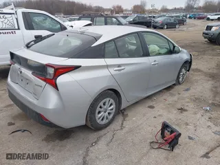 2019 Toyota Prius L Eco with VIN JTDKARFU4K3079789, listed as a IAAI auction lot 41897586 with 93,593 mi miles. Bid and sale history available at carsss.com. Image 4.