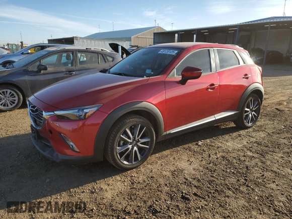 2018 Mazda CX-3 Grand Touring z VIN JM1DKFD79J0313779, wystawiony jako Copart lot #49120125 z przebiegiem 40 703 mil mil oraz Szkody całkowita. Historia ofert i sprzedaży dostępna na DreamBid. Obrazek 1.