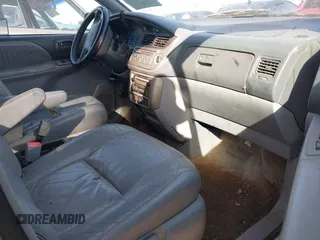 2001 Toyota Sienna LE with VIN 4T3ZF13CX1U327083, listed as a IAAI auction lot 41588036 with 220,064 mi miles. Bid and sale history available at carsss.com. Image 5.