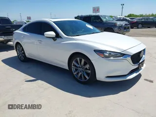 2021 Mazda 6 Touring with VIN JM1GL1VM4M1618686, listed as a IAAI auction lot 42079730 with 55,539 mi miles and . Bid and sale history available at DreamBid. Image 1.