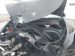 2021 Tesla Model Y Standard Range with VIN 5YJYGDED9MF103989, listed as a IAAI auction lot 41482268 with 33,485 mi miles and . Bid and sale history available at DreamBid. Image 10.