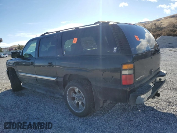 2005 GMC Yukon XL SLE with VIN 1GKEC16Z75J152954, listed as a Copart auction lot 86588284 with 164,185 mi miles and Salvage Title. Bid and sale history available at DreamBid. Image 2.