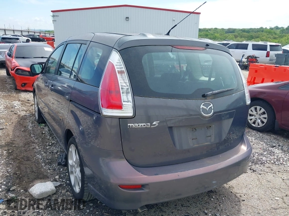2009 Mazda 5 Touring with VIN JM1CR29LX90333914, listed as a IAAI auction lot 42101304 with 129,470 mi miles. Bid and sale history available at carsss.com. Image 3.