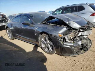 2022 Audi e-tron GT Premium Plus z VIN WAUFJBFWXN7008942, wystawiony jako Copart lot #77193994 z przebiegiem 22 917 mil mil oraz Szkody całkowita. Historia ofert i sprzedaży dostępna na DreamBid. Obrazek 4.