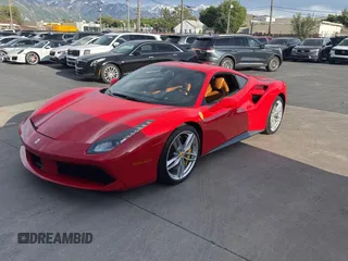 2016 Ferrari 488 z VIN ZFF79ALA0G0214884, wystawiony jako Copart lot #58627785 z przebiegiem 6311 mil mil oraz Szkody całkowita. Historia ofert i sprzedaży dostępna na DreamBid. Obrazek 2.