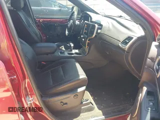 2014 Jeep Grand Cherokee Summit with VIN 1C4RJFJT1EC237358, listed as a IAAI auction lot 42602245 with 106,821 mi miles and . Bid and sale history available at DreamBid. Image 5.
