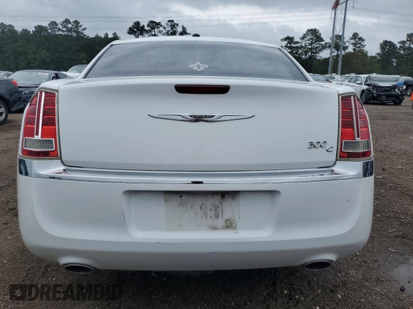 2013 Chrysler 300 C z VIN 2C3CCAET7DH661673, wystawiony jako Copart lot #55738325 z przebiegiem 103 694 mil mil oraz Szkoda całkowita • Salvage title. Historia ofert i sprzedaży dostępna na DreamBid. Obrazek 6.