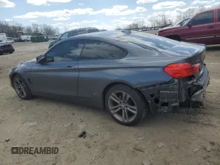 2015 BMW 4 Series 428i xDrive with VIN WBA3N9C55FK247227, listed as a Copart auction lot 50564735 with 121,882 mi miles and Salvage title. Bid and sale history available at DreamBid. Image 2.