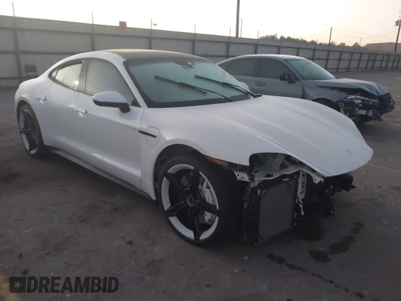 2022 Porsche Taycan with VIN WP0AA2Y10NSA13775, listed as a IAAI auction lot 40645854 with 19,149 mi miles and . Bid and sale history available at DreamBid. Image 1.