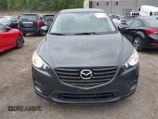 2016 Mazda CX-5 Sport with VIN JM3KE4BY9G0710004, listed as a IAAI auction lot 42323434 with 83,320 mi miles and . Bid and sale history available at DreamBid. Image 12.
