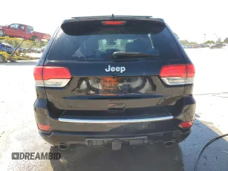 2017 Jeep Grand Cherokee Overland with VIN 1C4RJFCTXHC778491, listed as a Copart auction lot 73944594 with 99,235 mi miles and Clean Title. Bid and sale history available at carsss.com. Image 6.