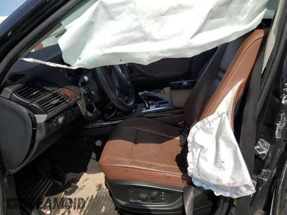 2012 BMW X5 35i with VIN 5UXZV4C54CL985119, listed as a Copart auction lot 56856735 with Not provided miles and Salvage title. Bid and sale history available at DreamBid. Image 7.