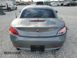 2011 BMW Z4 sDrive35i with VIN WBALM7C55BE382692, listed as a Copart auction lot 84460034 with 112,322 mi miles and Salvage Title. Bid and sale history available at carsss.com. Image 6.