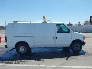 2006 Ford Econoline Cargo with VIN 1FTNE24L66HA64111, listed as a IAAI auction lot 41947445 with 205,025 mi miles and . Bid and sale history available at DreamBid. Image 12.