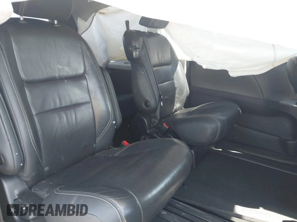 2018 Toyota Sienna SE with VIN 5TDXZ3DC9JS935123, listed as a IAAI auction lot 41955203 with 108,612 mi miles and . Bid and sale history available at DreamBid. Image 8.