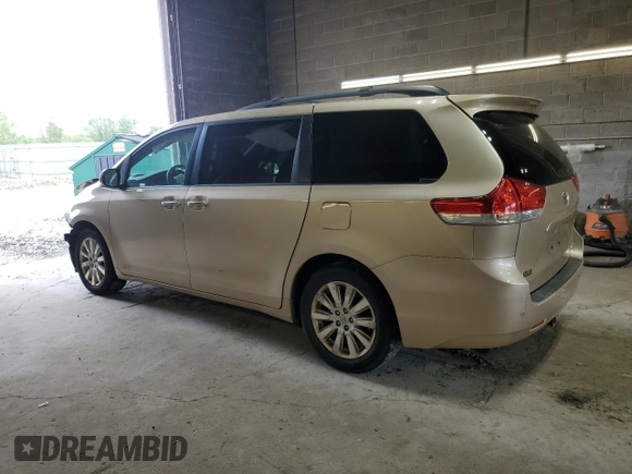 2012 Toyota Sienna XLE with VIN 5TDDK3DC1CS047265, listed as a Copart auction lot 58500275 with 203,548 mi miles and Salvage title. Bid and sale history available at DreamBid. Image 2.