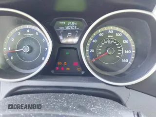 2012 Hyundai Elantra GLS z VIN KMHDH4AE5CU310634, wystawiony jako IAAI lot #42397828 z przebiegiem 120 503 mil mil oraz . Historia ofert i sprzedaży dostępna na DreamBid. Obrazek 7.