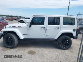 2015 Jeep Wrangler Unlimited Rubicon z VIN 1C4BJWFG1FL544883, wystawiony jako IAAI lot #42838891 z przebiegiem 87 801 mil mil oraz . Historia ofert i sprzedaży dostępna na DreamBid. Obrazek 14.