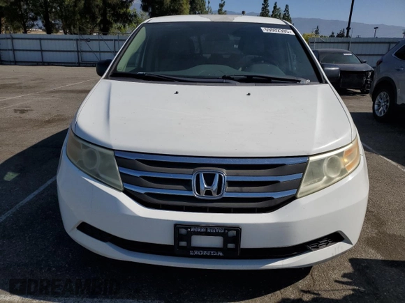 2011 Honda Odyssey LX z VIN 5FNRL5H2XBB054864, wystawiony jako Copart lot #59002395 z przebiegiem 146 987 mil mil oraz Czysty tytuł • Clean title. Historia ofert i sprzedaży dostępna na DreamBid. Obrazek 5.