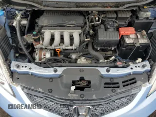 2009 Honda Fit Sport z VIN JHMGE88619S045049, wystawiony jako Copart lot #54223135 z przebiegiem 107 601 mil mil oraz Szkoda całkowita • Salvage title. Historia ofert i sprzedaży dostępna na DreamBid. Obrazek 11.