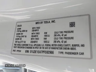 2023 Tesla Model 3 with VIN 5YJ3E1EA7PF592966, listed as a IAAI auction lot 41879794 with 13,423 mi miles and . Bid and sale history available at carsss.com. Image 9.