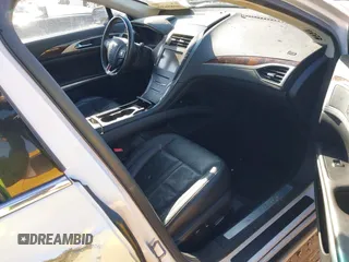 2013 Lincoln MKZ with VIN 3LN6L2G97DR822023, listed as a IAAI auction lot 41856396 with 129,056 mi miles and . Bid and sale history available at DreamBid. Image 5.