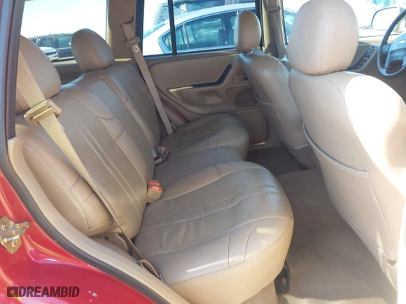 2004 Jeep Grand Cherokee Laredo with VIN 1J4GX48S64C401347, listed as a IAAI auction lot 41491111 with 189,436 mi miles. Bid and sale history available at carsss.com. Image 8.