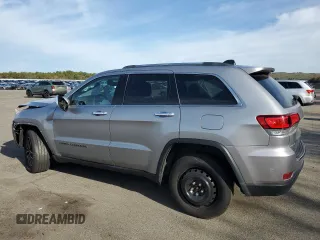 2021 Jeep Grand Cherokee 80th Anniversary with VIN 1C4RJFBG7MC665757, listed as a Copart auction lot 52443235 with 99,828 mi miles and Salvage Title. Bid and sale history available at DreamBid. Image 2.