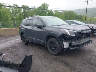 2022 Subaru Forester Wilderness with VIN JF2SKAMC9NH405443, listed as a IAAI auction lot 42257745 with 52,464 mi miles and . Bid and sale history available at DreamBid. Image 1.