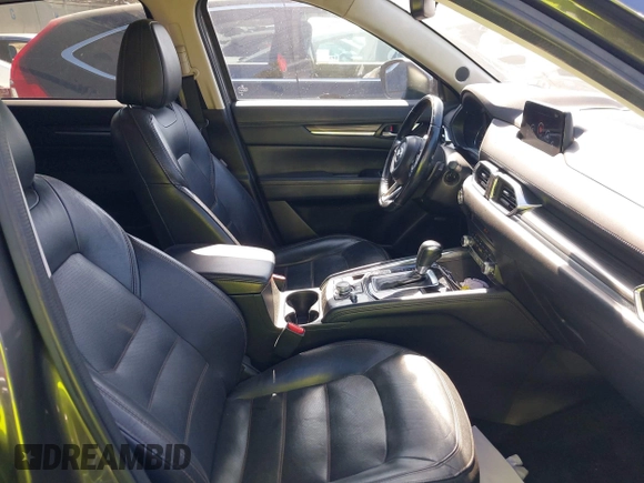2020 Mazda CX-5 Grand Touring with VIN JM3KFADM3L1812649, listed as a IAAI auction lot 42575393 with 102,118 mi miles and . Bid and sale history available at DreamBid. Image 5.