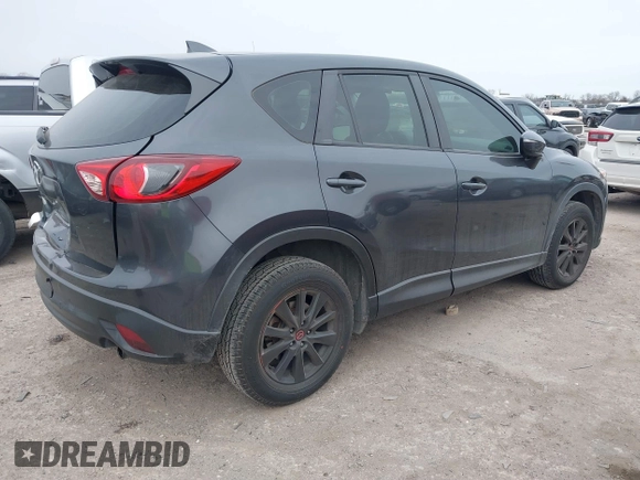 2016 Mazda CX-5 Sport with VIN JM3KE2BY4G0858100, listed as a IAAI auction lot 41368135 with 93,435 mi miles. Bid and sale history available at carsss.com. Image 4.