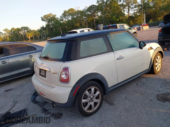 2011 MINI Hardtop with VIN WMWSU3C58BT097825, listed as a IAAI auction lot 42040442 with 141,978 mi miles and . Bid and sale history available at DreamBid. Image 4.