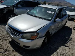 2009 Kia Spectra EX with VIN KNAFE222595663938, listed as a Copart auction lot 69422764 with 251,066 mi miles and Salvage Title. Bid and sale history available at carsss.com. Image 1.