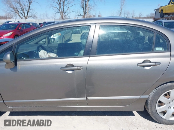 2006 Honda Civic LX with VIN 1HGFA16596L049500, listed as a IAAI auction lot 41801330 with 176,484 mi miles and . Bid and sale history available at DreamBid. Image 14.