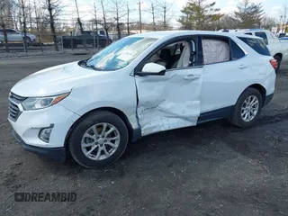 2020 Chevrolet Equinox LT z VIN 2GNAXKEV8L6141918, wystawiony jako IAAI lot #41882535 z przebiegiem 125 974 mil mil oraz . Historia ofert i sprzedaży dostępna na DreamBid. Obrazek 18.