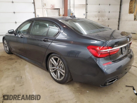2019 BMW 7 Series 740i xDrive with VIN WBA7E4C51KGV70174, listed as a Copart auction lot 54117075 with 48,743 mi miles and Salvage Title. Bid and sale history available at carsss.com. Image 2.