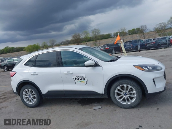 2020 Ford Escape SE with VIN 1FMCU9G67LUC31633, listed as a IAAI auction lot 42173290 with 136,937 mi miles and . Bid and sale history available at DreamBid. Image 13.